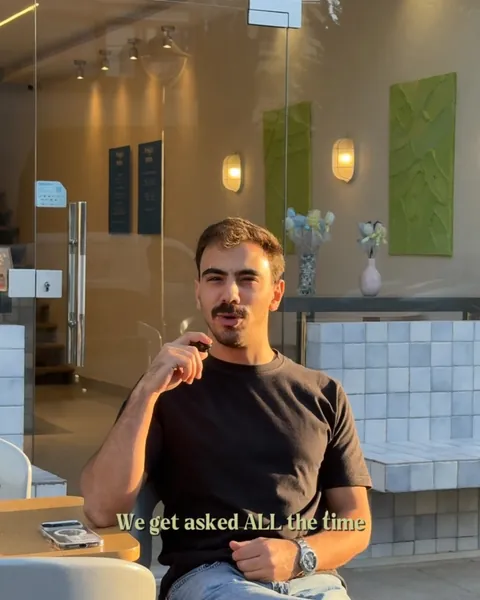 Froyo team member in the shop, talking about the secret flavours